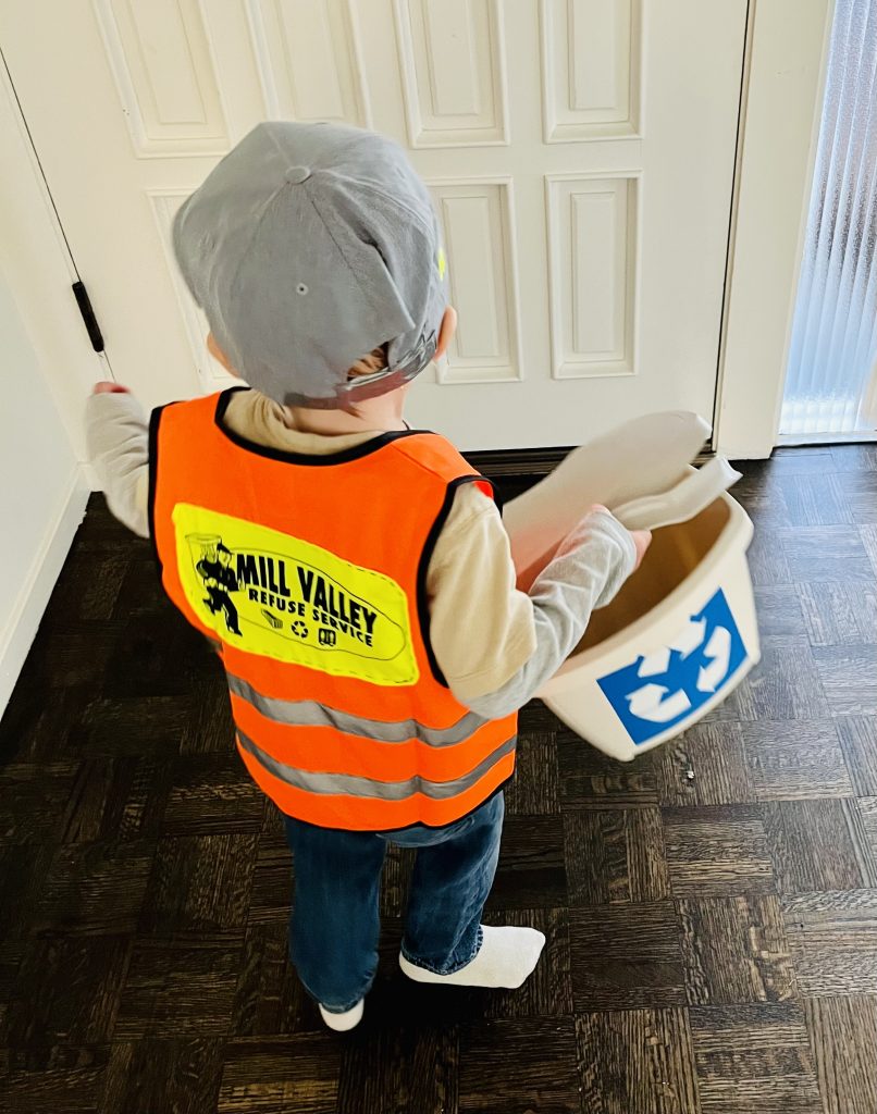 Image: Back of child wearing garbage collecter outfit for Halloween