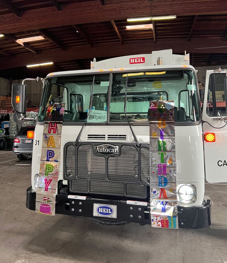 Birthday decorated garbage truck.