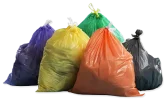 Colorful garbage bags in a pile for curbside cleanups